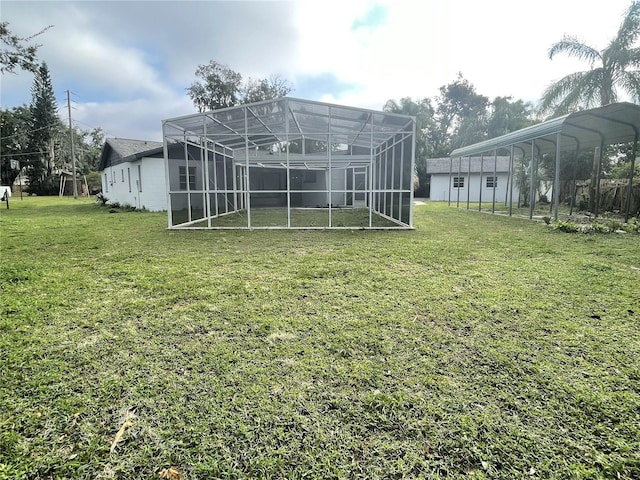 view of yard with glass enclosure