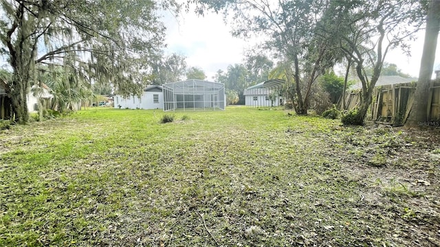 view of yard with an outdoor structure