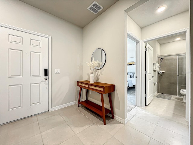 view of tiled entrance foyer