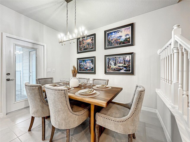 4190 Lana Ave, Davenport, FL 33897 - dining room featuring light tile patterned flooring and a chandelier