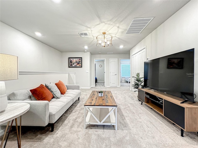 4190 Lana Ave, Davenport, FL 33897 - living room featuring a chandelier, light carpet, and recessed lighting