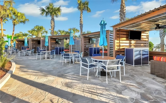 4190 Lana Ave, Davenport, FL 33897 - view of patio with outdoor dining area and ceiling fan