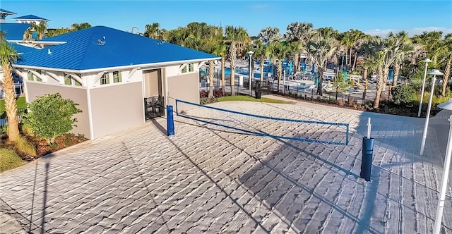 view of property's community featuring volleyball court