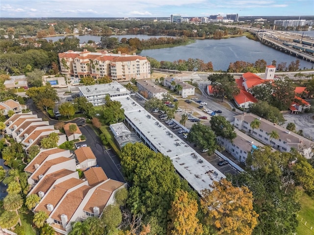 birds eye view of property featuring a water view