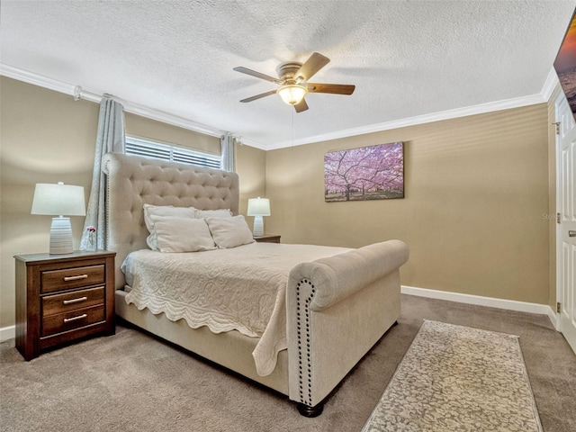 carpeted bedroom with a ceiling fan, baseboards, crown molding, and a textured ceiling