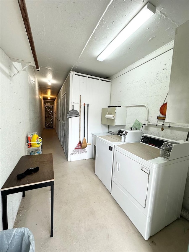 laundry room featuring independent washer and dryer