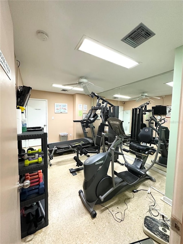 workout area featuring ceiling fan