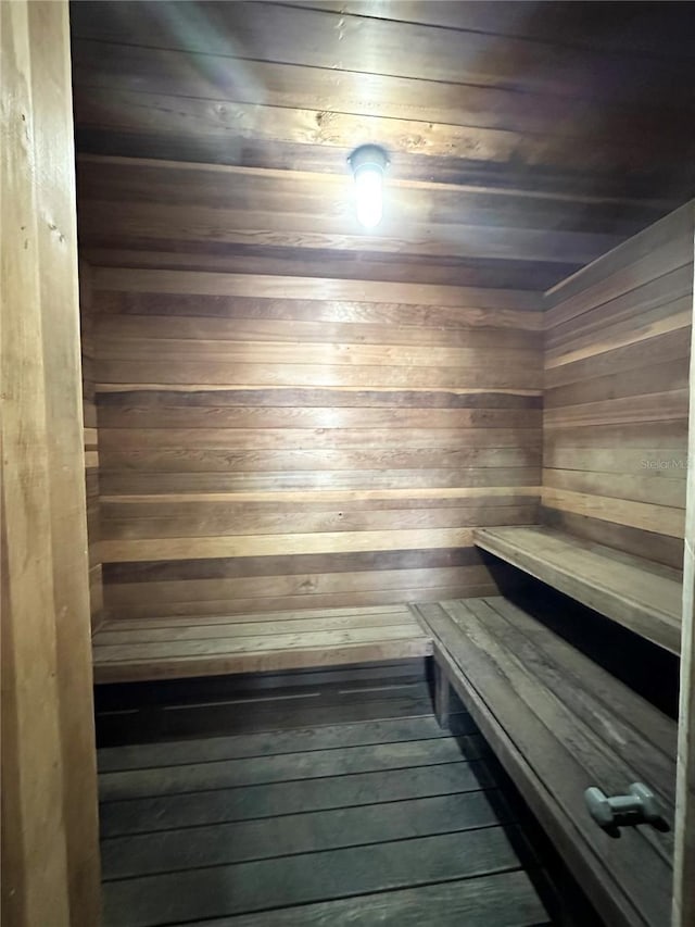 230 Cape Shores Cir Unit 17A, Cape Canaveral, FL 32920 - sauna / steam room with wood ceiling, wooden walls, and wood-type flooring