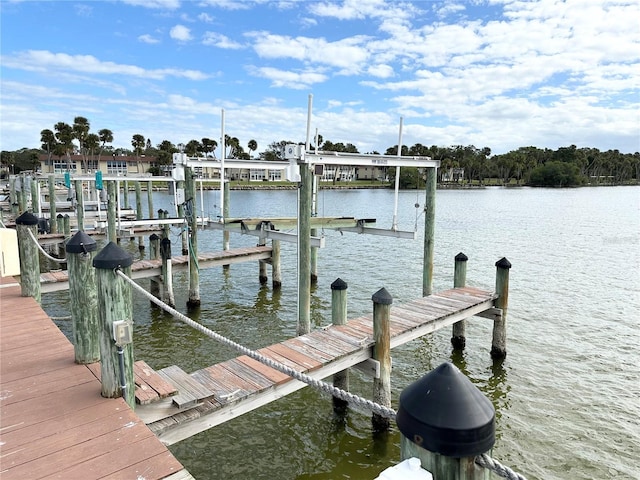 dock area featuring a water view