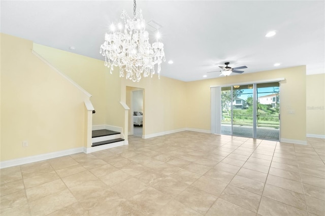 unfurnished living room with ceiling fan with notable chandelier and light tile patterned floors