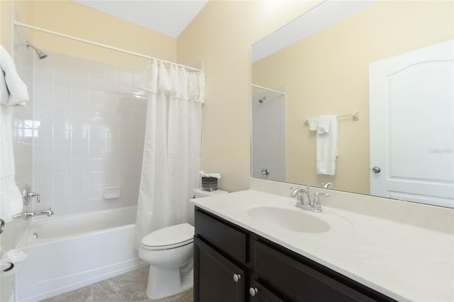 full bathroom with tile patterned flooring, shower / bath combo, toilet, and vanity