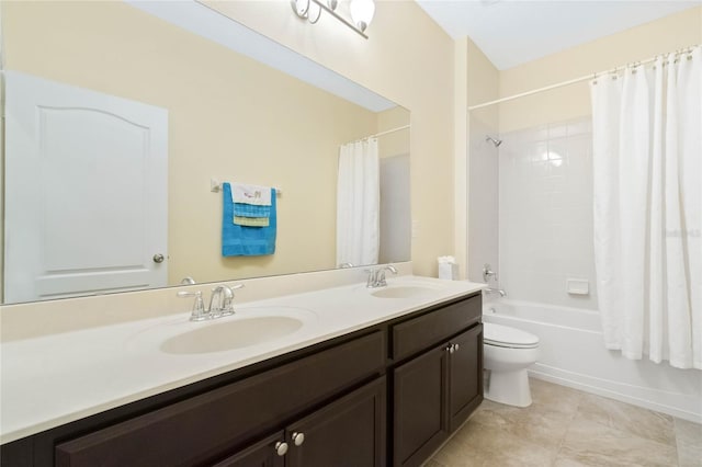 full bathroom with tile patterned flooring, shower / bath combo, vanity, and toilet