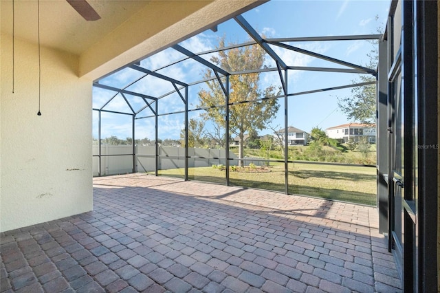 view of patio / terrace with a lanai