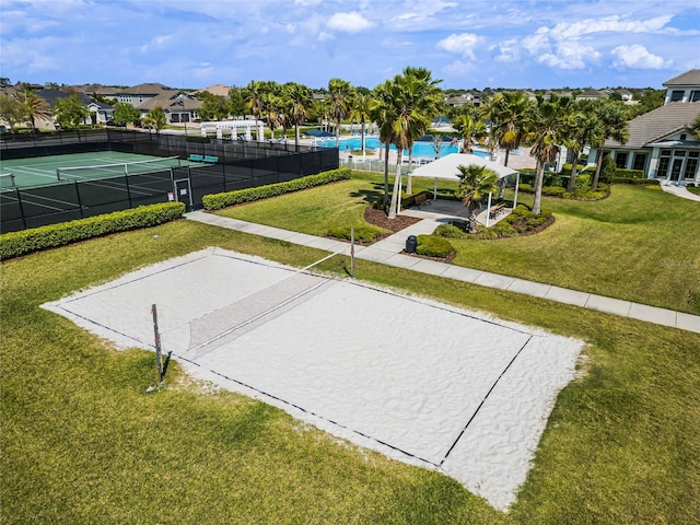 view of home's community with volleyball court, a gazebo, a yard, and tennis court