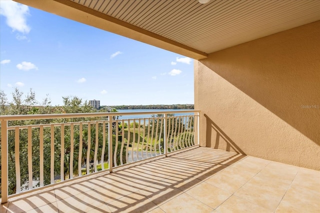 balcony featuring a water view