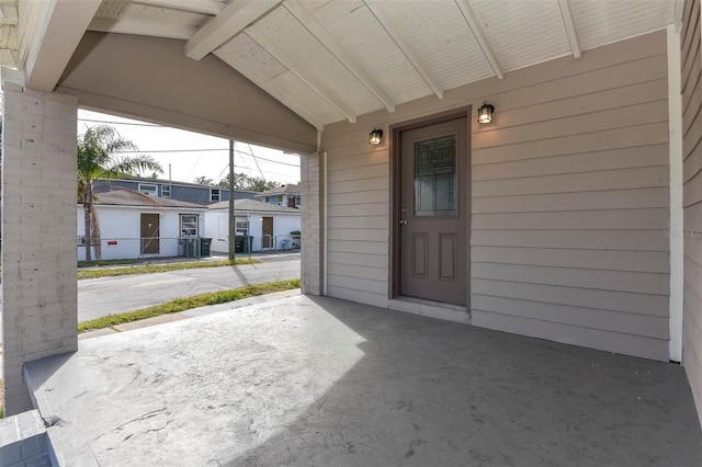 doorway to property with a residential view