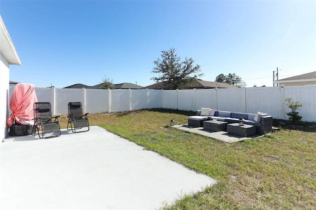 view of yard featuring a patio area and an outdoor living space