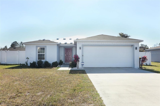 single story home with a garage and a front lawn