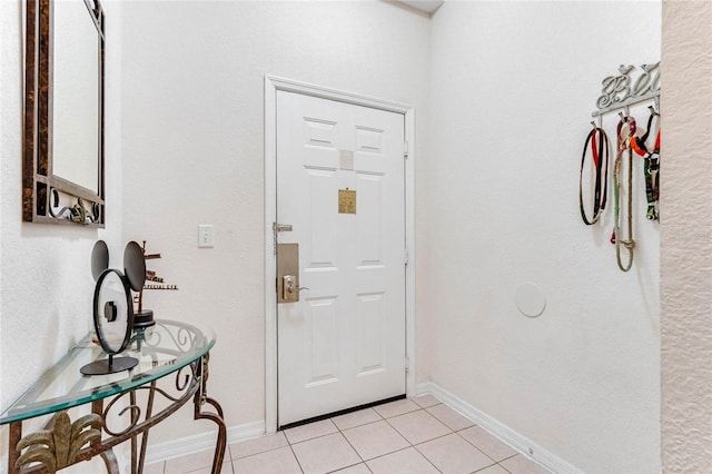 view of tiled foyer entrance