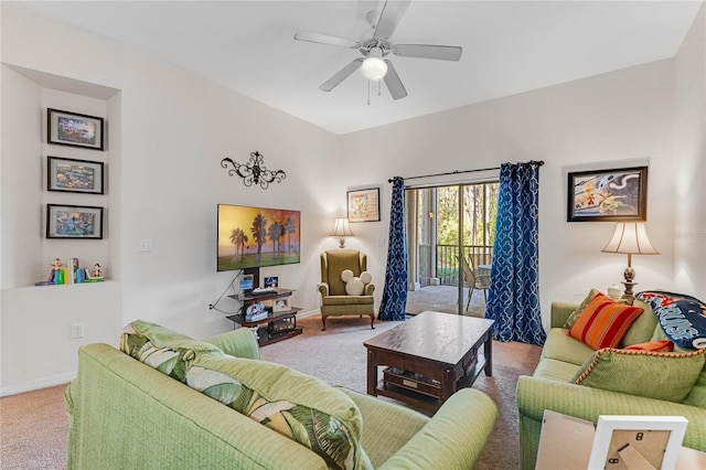 living room featuring carpet flooring and ceiling fan