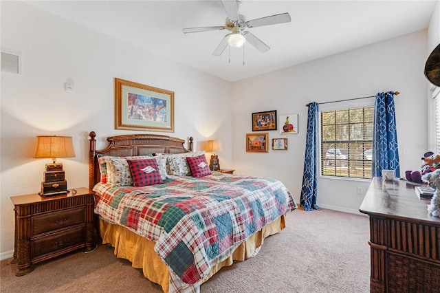 carpeted bedroom featuring ceiling fan