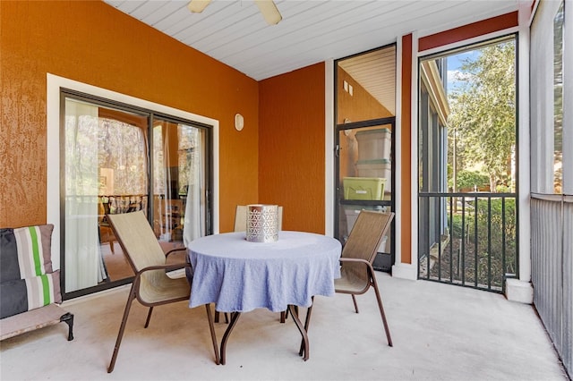 sunroom featuring wooden ceiling