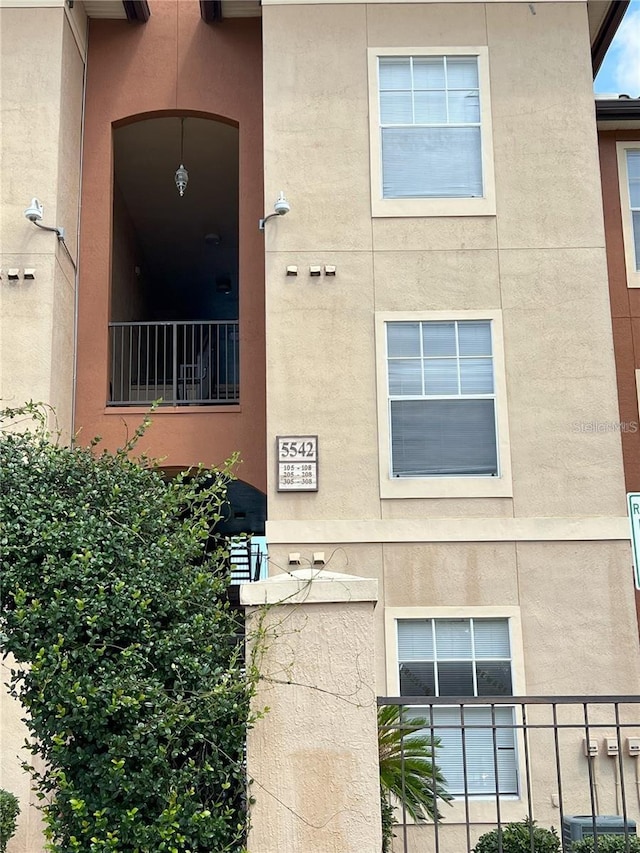 view of property featuring central air condition unit