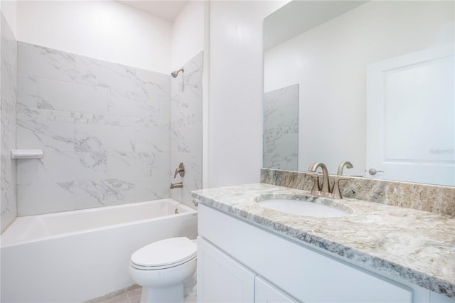 full bathroom featuring tile patterned floors, vanity, toilet, and tiled shower / bath