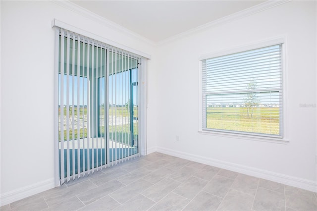 spare room with crown molding