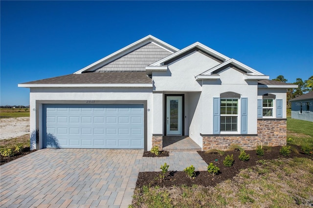 view of front of property with a garage