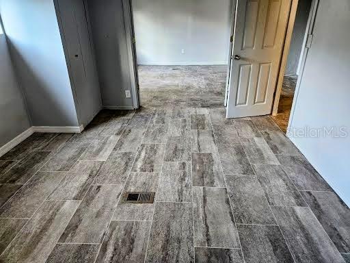 interior space with dark wood-type flooring