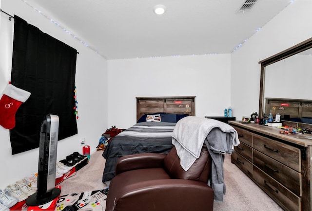 bedroom featuring light colored carpet