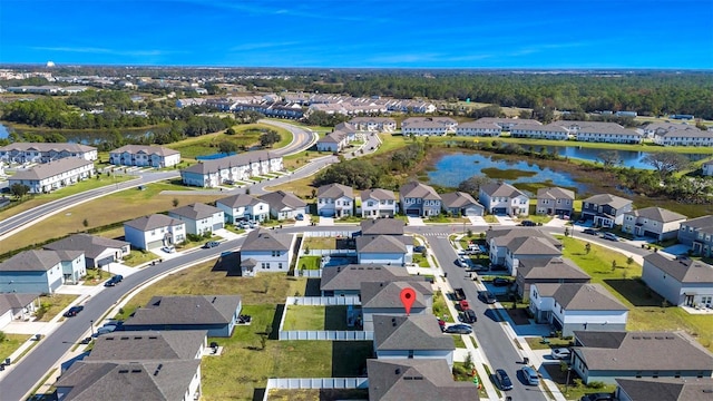 drone / aerial view featuring a water view