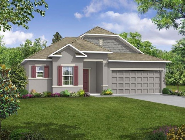 view of front of property featuring a front lawn and a garage