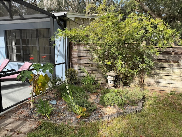 view of yard with a lanai