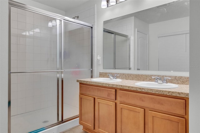 2325 Crossandra St, Mascotte, FL 34753 - full bath featuring a shower stall and double vanity