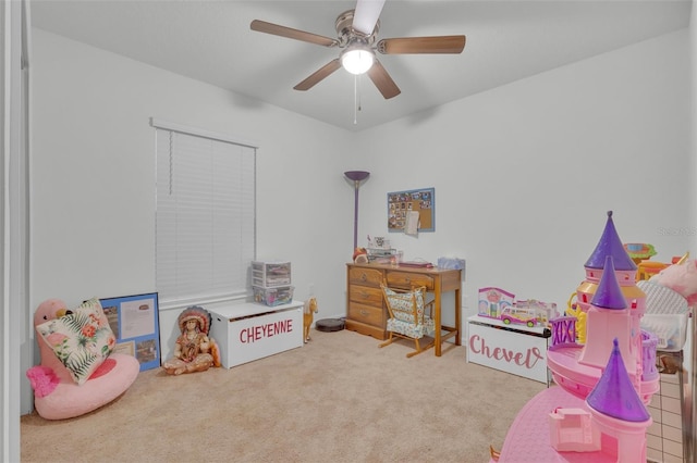 rec room with ceiling fan and carpet floors