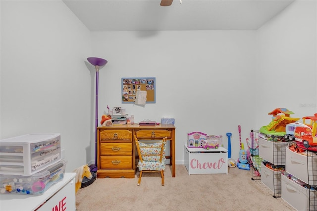 rec room with ceiling fan and carpet floors