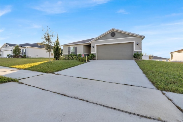 ranch-style house with a front lawn and a garage