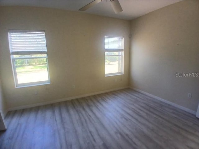 spare room featuring hardwood / wood-style floors