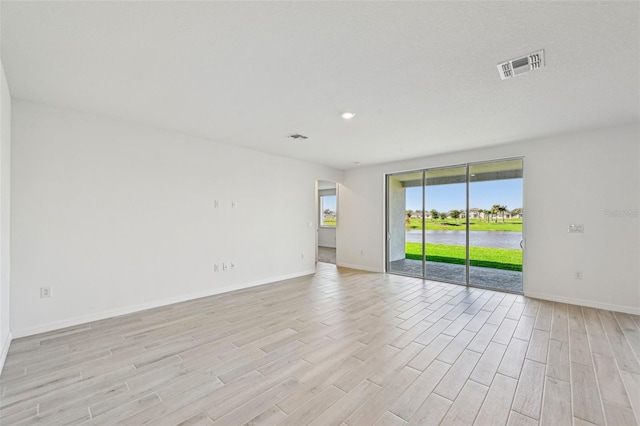 empty room featuring light hardwood / wood-style flooring