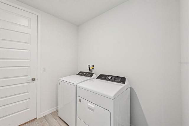 laundry area featuring independent washer and dryer