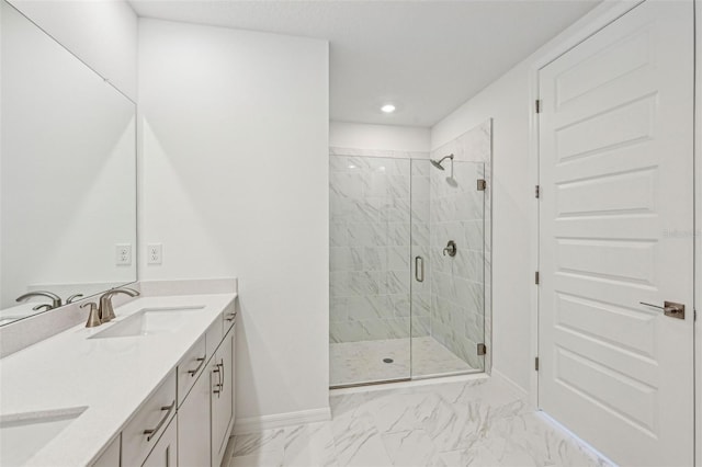 bathroom with walk in shower and vanity