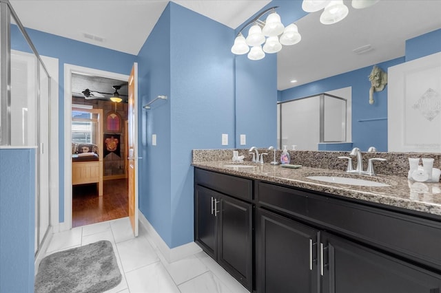 bathroom featuring vanity, a shower with door, ceiling fan, and hardwood / wood-style flooring