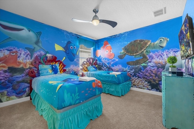 bedroom with carpet, a textured ceiling, and ceiling fan