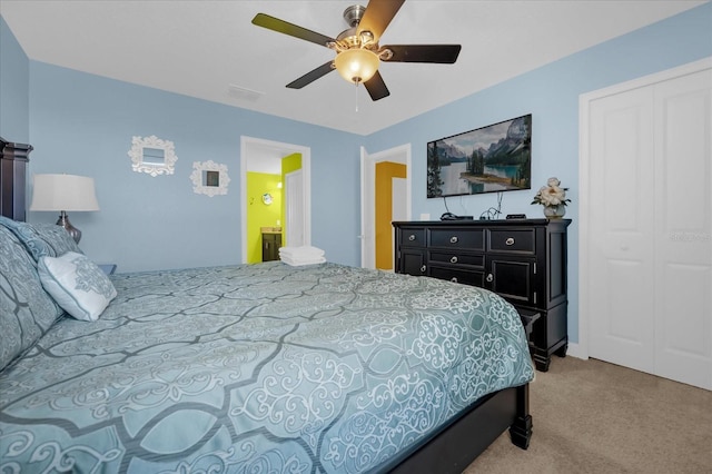 bedroom with light carpet, a closet, and ceiling fan