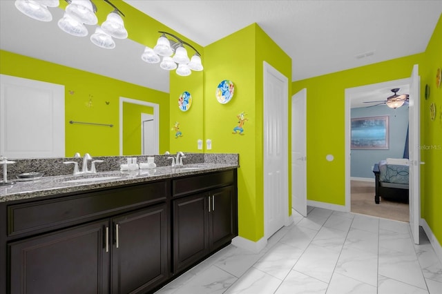 bathroom with vanity and ceiling fan