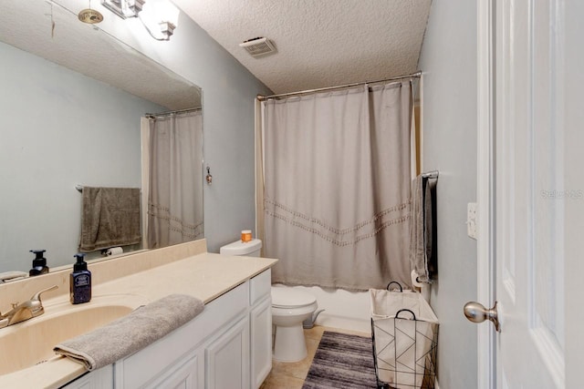 full bathroom with tile patterned floors, a textured ceiling, vanity, shower / bathtub combination with curtain, and toilet