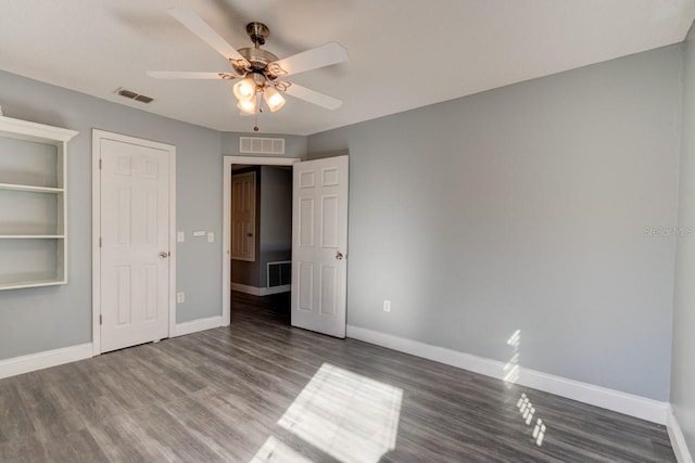 unfurnished bedroom with hardwood / wood-style floors and ceiling fan