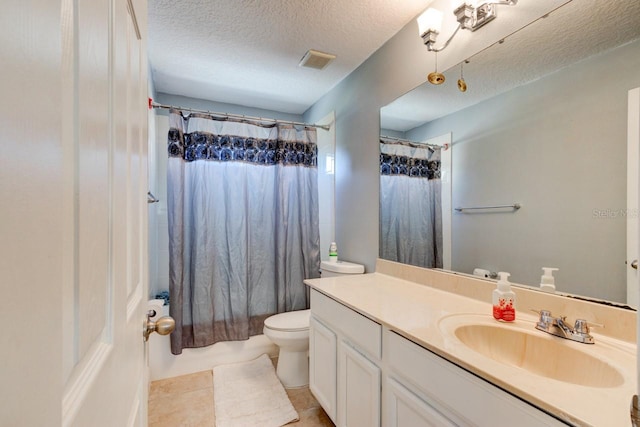 full bathroom with vanity, a textured ceiling, shower / bathtub combination with curtain, tile patterned flooring, and toilet